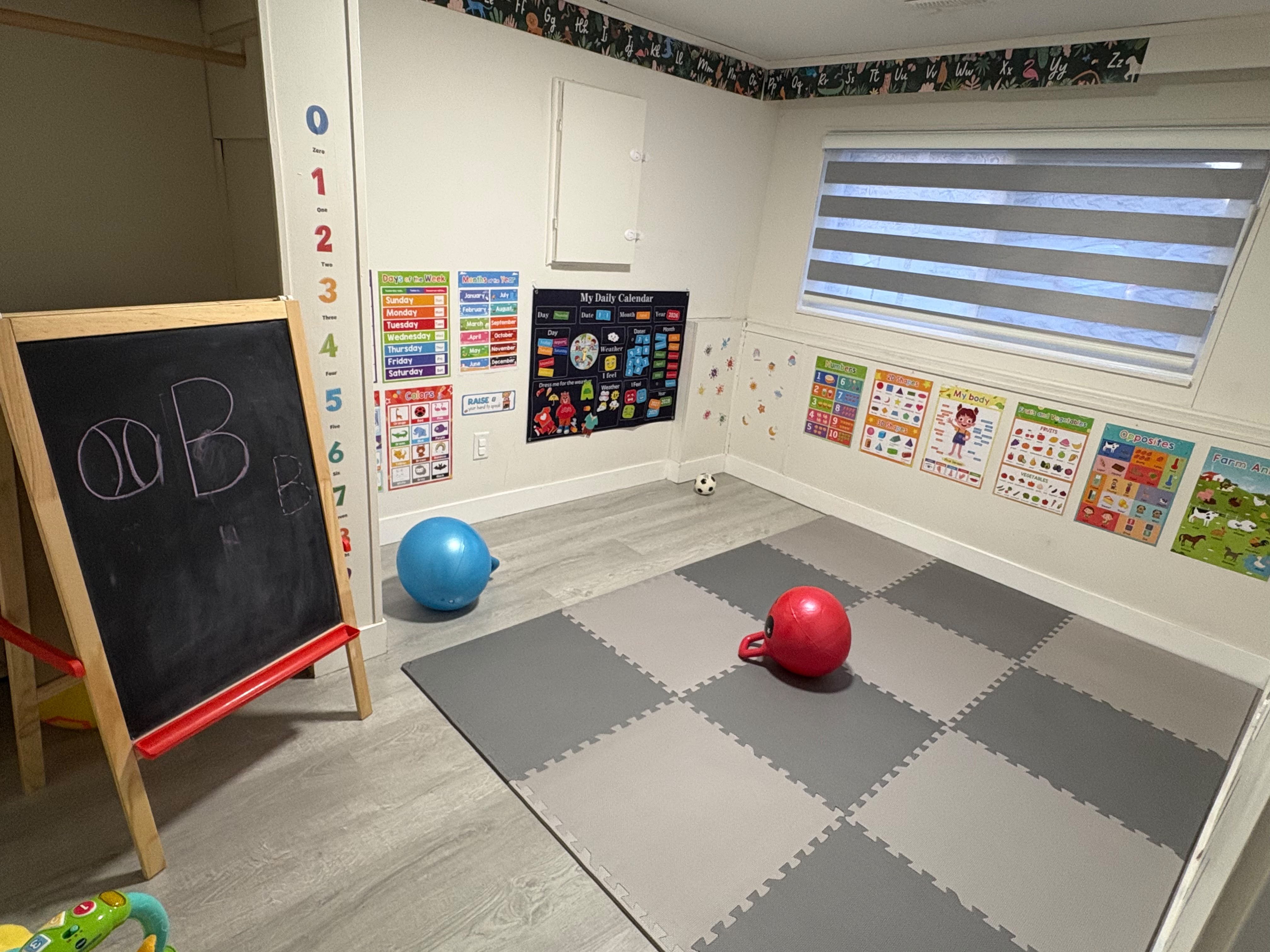 Indoor movement room with exercise equipment and learning materials